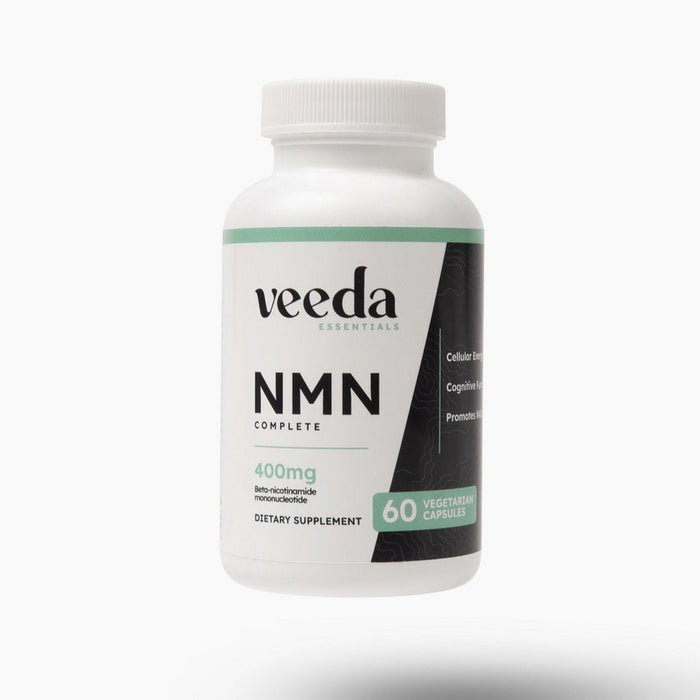 Veda NMN supplement bottle on a white background