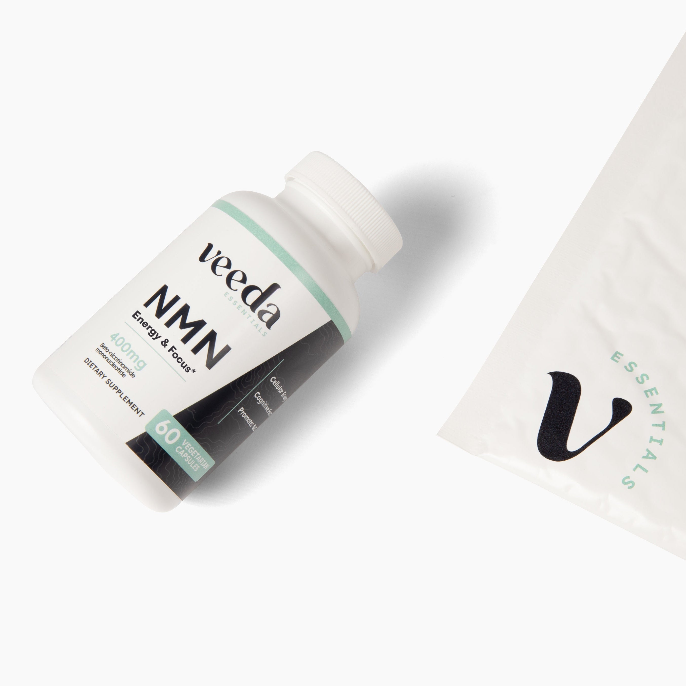 Veeda NMN supplement bottle and packaging on a white background