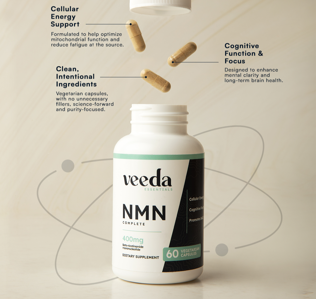 Veeda NMN Complete supplement bottle with wooden capsules on a beige background