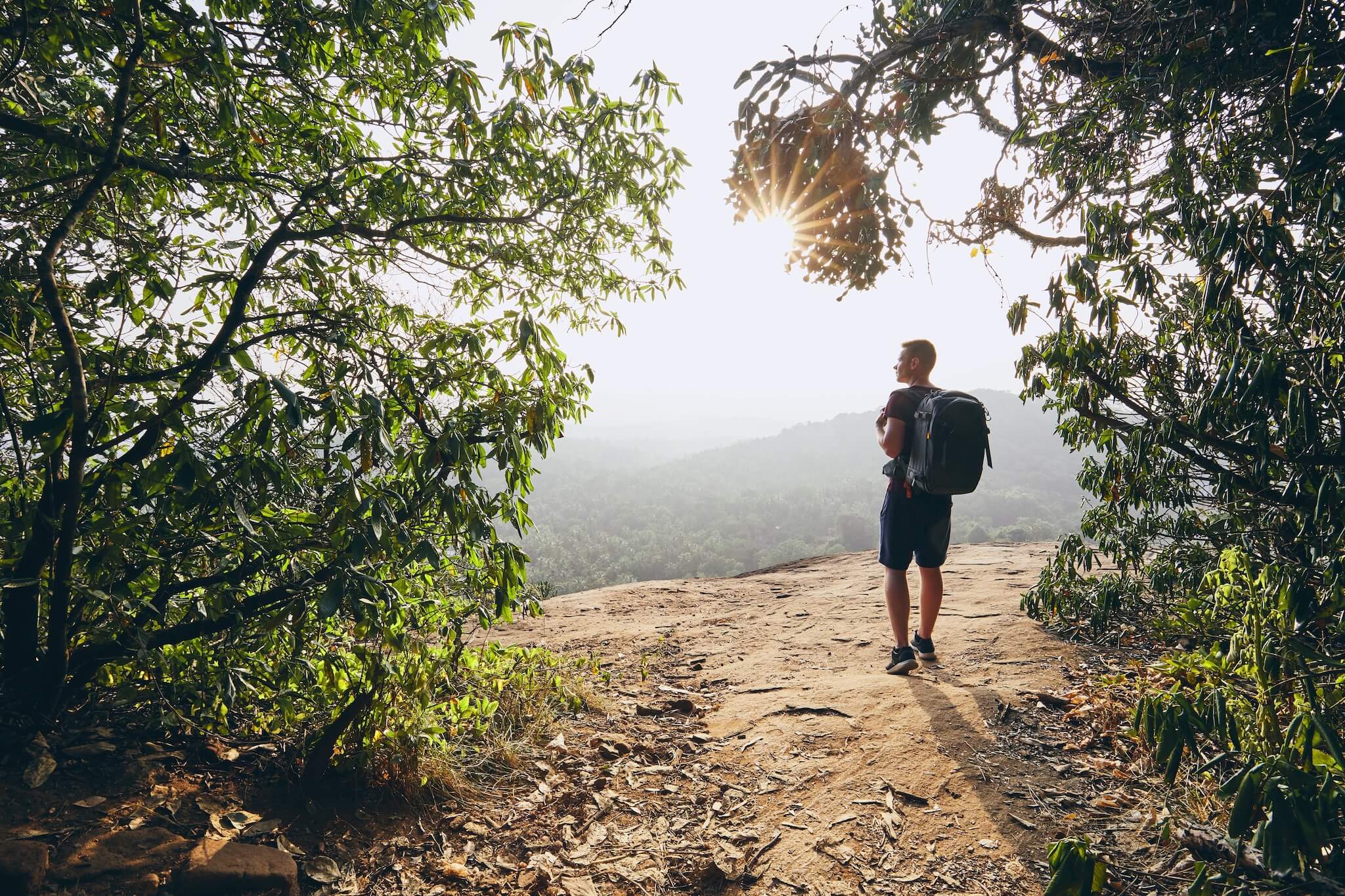 young-hiker-overlooking-view-from-rock-landscape-2025-02-16-09-41-10-utc_1.jpg